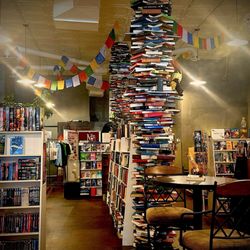 The Midnight Oil - Seating area and book art sculpture.