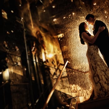 Vertigo Event Venue - Bride and Groom captured on our iconic mirrored-glass staircase - Venues & Event Spaces Near Me - Glendale, California