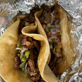 Cancun Mexican Grill - 2 of the 4 carne asada street tacos - American Near Me - Ellis, Kansas