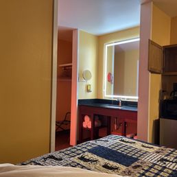 The bathroom light is a heat lamp I love it! It is nice and cozy as well.