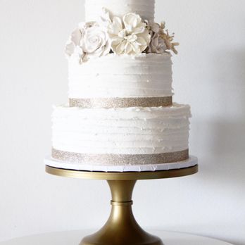 Social Bites - a white wedding cake on a gold stand - Bakeries Near Me - Ruston, Louisiana Social Bites - a white wedding cake on a gold stand - Bakeries Near Me - Ruston, Louisiana
