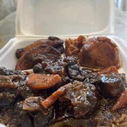 Dirty Tiff's Cafe - Oxtails, yams, rice, and peas.