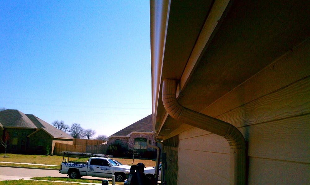 Slide of MB Texas Co Roofing