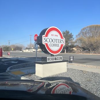 Scooter's Coffee - a sign for a coffee shop - Coffee & Tea Near Me - Riverton, Utah