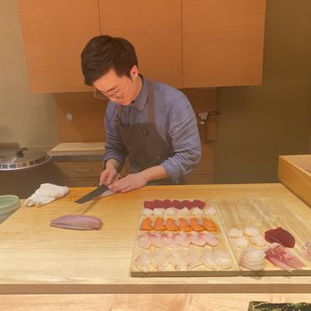 Sushi Ai - Chef Brandon slicing fish - Japanese Near Me - Redwood City, California Sushi Ai - Chef Brandon slicing fish - Japanese Near Me - Redwood City, California