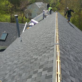 Sousa Roofing & Siding - This large roof was stripped and new roof was installed in one day. - Roofing Near Me - Fairhaven, Massachusetts Sousa Roofing & Siding - This large roof was stripped and new roof was installed in one day. - Roofing Near Me - Fairhaven, Massachusetts