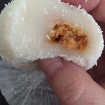 QQ Bakery - Peanut-filled chewy rice snowball thing. It actually has way more filling than this picture leads you to think! - Bakeries Near Me - Madison Heights, Michigan QQ Bakery - Peanut-filled chewy rice snowball thing. It actually has way more filling than this picture leads you to think! - Bakeries Near Me - Madison Heights, Michigan