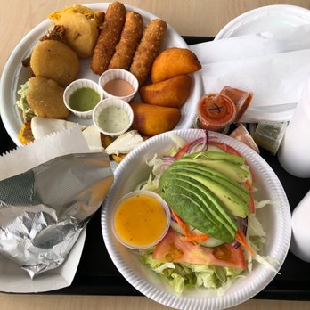 Doña Arepa - The sample platter, a salad and an arepa with shredded beef. The best part were the tiny empanadas. - Venezuelan Near Me - Greenacres, Florida