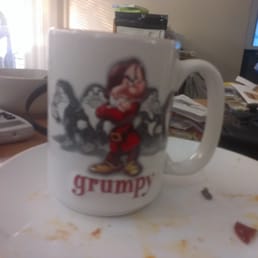 a coffee cup on a plate