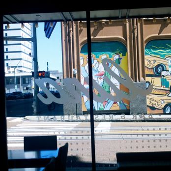 Luna Bar and Restaurant - a view of a mural on the side of a building - New American Near Me - Memphis, Tennessee Luna Bar and Restaurant - a view of a mural on the side of a building - New American Near Me - Memphis, Tennessee