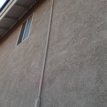 Best Roofing Los Angeles - Only one conduit pipe to garage from the solar panels that they painted to match the house color. - Roofing Near Me - Pasadena, California Best Roofing Los Angeles - Only one conduit pipe to garage from the solar panels that they painted to match the house color. - Roofing Near Me - Pasadena, California