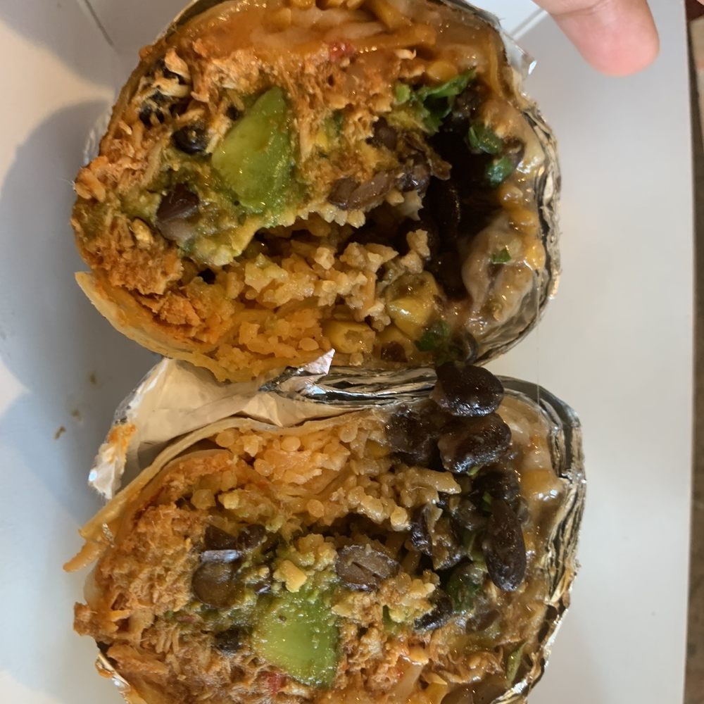 Chicken burrito called "The Anaconda Squeeze", huge portion and so delicious! Chicken burrito called "The Anaconda Squeeze", huge portion and so delicious!