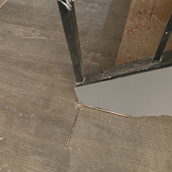 United Flooring - a close up of a floor with a hole in it - Flooring Near Me - Fairfield, California