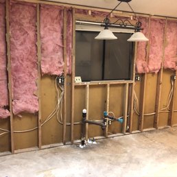 Down to the studs and floor boards