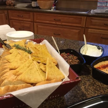 Gourmondo - Pita and bread with olive tapenade, mesquite-smoked hummus, and tzatziki. - Caterers Near Me - Seattle, Washington