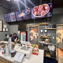 Asuka Ramen & Poke Englewood - The lady in charge of the kitchen concocting my poke bowl