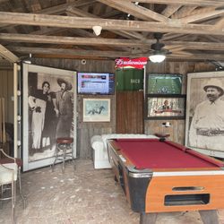 Blackie’s Gas Stop - Pool table and to the left, cigar bar/couch.