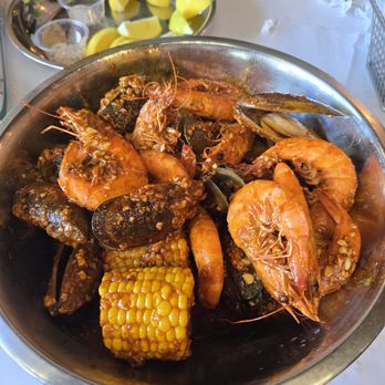 The Crawfish Hut - Shrimp Head-On and Green Mussels in Hut Special sauce in Flaming spice level - Cocktail Bars Near Me - Stanton, California The Crawfish Hut - Shrimp Head-On and Green Mussels in Hut Special sauce in Flaming spice level - Cocktail Bars Near Me - Stanton, California