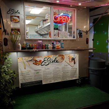 E-Side Thai Cuisine - a neon sign in the window - Thai Near Me - Portland, Oregon