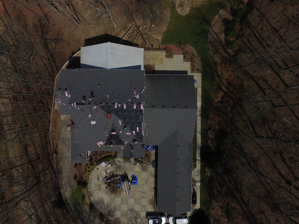 Slide of Suburban Roofing