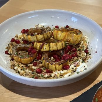 Crave Kitchen - Braised squash with ricotta, walnut pesto and pomegranate - New American Near Me - Salem, South Carolina Crave Kitchen - Braised squash with ricotta, walnut pesto and pomegranate - New American Near Me - Salem, South Carolina