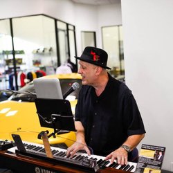 Piano Lessons In Dallas - Mark Ripley Performing - Lamborghini of Dallas