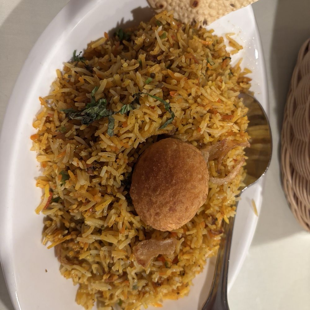 Bhansa Ghar - Lamb biryani with egg on top - Himalayan/Nepalese Near Me - Salt Lake City, Utah Bhansa Ghar - Lamb biryani with egg on top - Himalayan/Nepalese Near Me - Salt Lake City, Utah