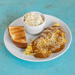 Motor City Grille - Detroit Omelet, made with 3 eggs, sautéed onions, shredded cheese & smothered in chili.