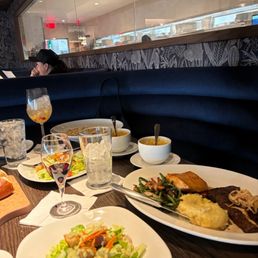 House salad and surf and turf steak with salmon.