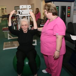 Advantage Healthcare - Patient Rehabbing on Exercise Ball