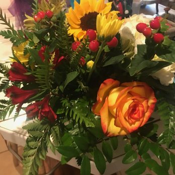 Milestone Floral - What was delivered.... Lots of greenery with a few nice flowers. - Florists Near Me - Abilene, Texas