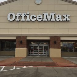 OfficeMax - Uninviting facade says "Try Us! We'll make you love Amazon!"
