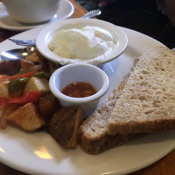 Sarabeth's Key West - Eggs poached, toast and house made marmalade, with breakfast potatoes. - American Near Me - Key West, Florida Sarabeth's Key West - Eggs poached, toast and house made marmalade, with breakfast potatoes. - American Near Me - Key West, Florida