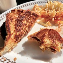 Half eaten Texas Angus Patty Melt (1/4 Lb.) $11- very yummy