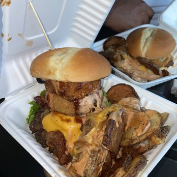 Seven Brothers - Paniolo ( COWBOY ) Burger and in the back is SPENCER BURGER. Both with crazy fries. - Burgers Near Me - Laie, Hawaii Seven Brothers - Paniolo ( COWBOY ) Burger and in the back is SPENCER BURGER. Both with crazy fries. - Burgers Near Me - Laie, Hawaii