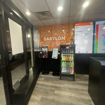 ATL Wing Spot - Well stocked drink refrigerator and the self service kiosks - Chicken Wings Near Me - Babylon, New York