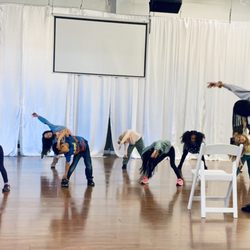 DF Dance Studio - Kids Hip Hop class stretching in rehearsal.
