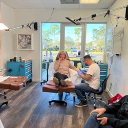 Oddity Tattoo Art University - This is my mother-in-law in the chair, they gave her a lollipop and tattooed Bob on her arm, so he will forever be with her