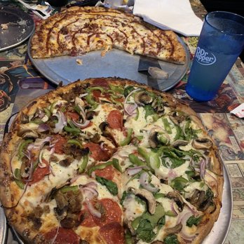 LeaderBoard Arcade Bar - Deep dish 1/2 veggie and 1/2 supreme - Bars Near Me - Orange Park, Florida