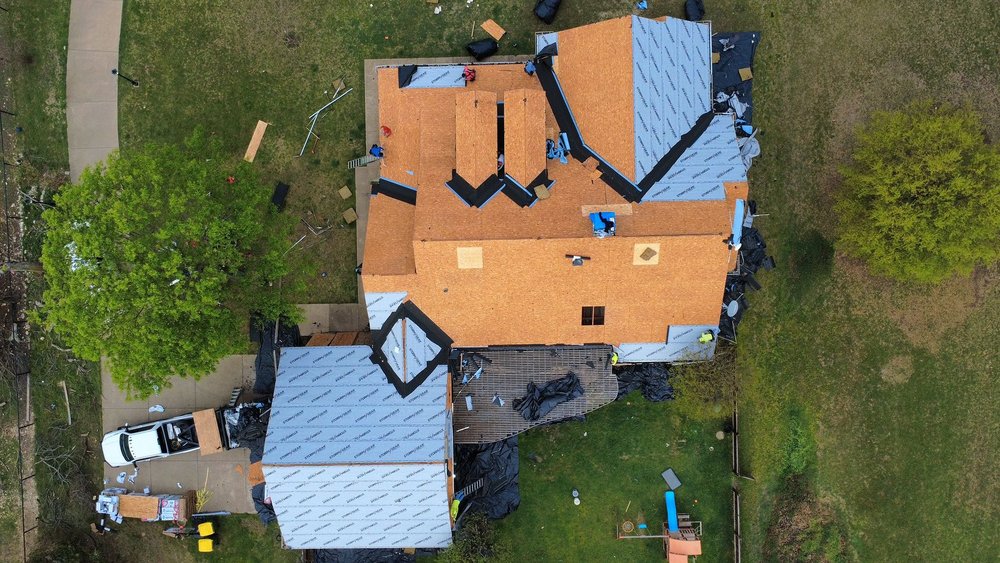 Slide of Blue Hammer Roofing