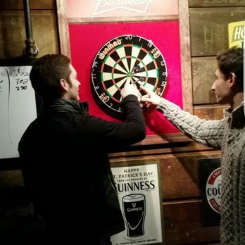 Penuche's Ale House - two men playing darts - Bars Near Me - Concord, New Hampshire Penuche's Ale House - two men playing darts - Bars Near Me - Concord, New Hampshire