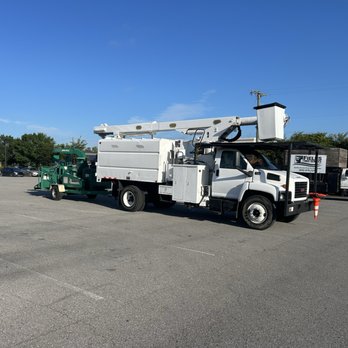 Wes Lee Tree Care - This is our 75ft bucket truck and wood chipper. - Tree Services Near Me - Hendersonville, Tennessee Wes Lee Tree Care - This is our 75ft bucket truck and wood chipper. - Tree Services Near Me - Hendersonville, Tennessee