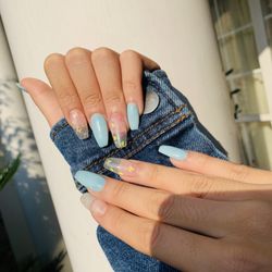 Elegant Nails - Blue and clear butterfly design acrylic nails