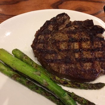 Outback Steakhouse - Ribeye with asparagus - Steakhouses Near Me - Mooresville, North Carolina Outback Steakhouse - Ribeye with asparagus - Steakhouses Near Me - Mooresville, North Carolina