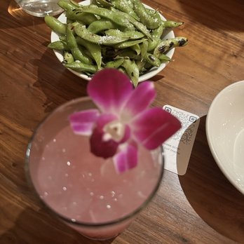 Uchi Miami - Edamame and Pink Dragon drink - Asian Fusion Near Me - Miami, Florida Uchi Miami - Edamame and Pink Dragon drink - Asian Fusion Near Me - Miami, Florida