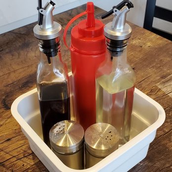 The Big Catch - Malt vinegar, ketchup, salt and pepper. - Seafood Near Me - Markham, Ontario