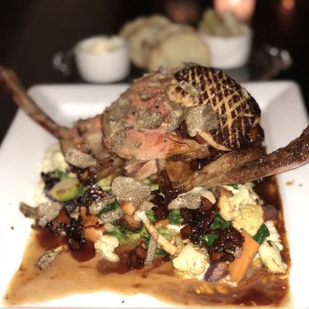 Heritage Tavern - Tomahawk for 2 with foie gras. - New American Near Me - Madison, Wisconsin