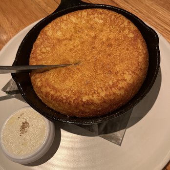 Husk - Cornbread skillet! Perfectly crispy on the outside - American Near Me - Charleston, South Carolina