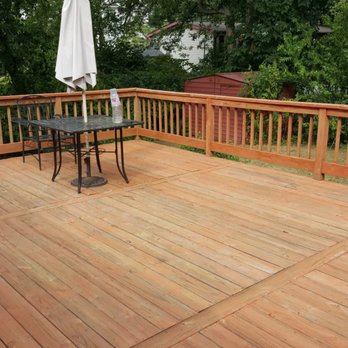 Perrys Home Services - deck with table and umbrella - Landscaping Near Me - Bohemia, New York