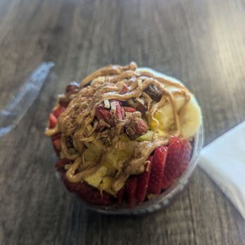 Dear Acai - Killer acai base with some blue pineapple thrown in, granola, all their fruits, goji berries, toasted coconut, peanut butter and cinnamon. - Acai Bowls Near Me - Garden Grove, California Dear Acai - Killer acai base with some blue pineapple thrown in, granola, all their fruits, goji berries, toasted coconut, peanut butter and cinnamon. - Acai Bowls Near Me - Garden Grove, California